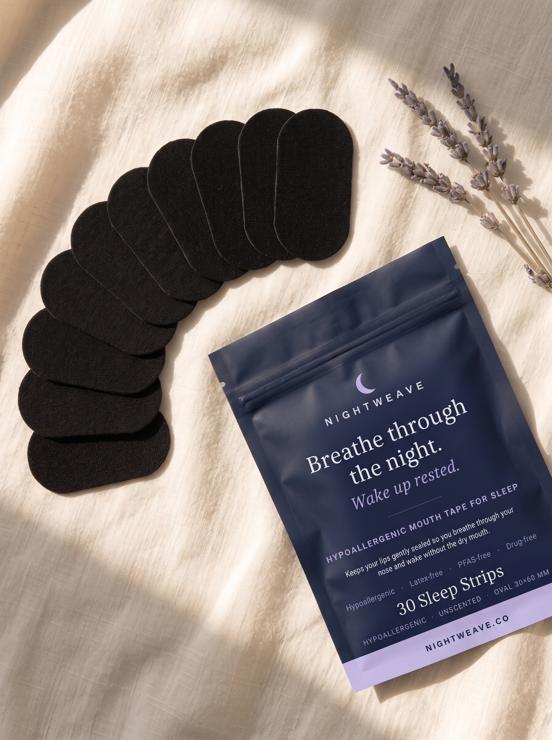 NIGHTWEAVE mouth tape strips fanned out beside the pouch on linen with lavender